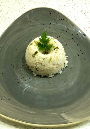 Una foto de Arroz con tallitos de perejil