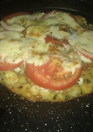 Una foto de Tortilla de papa ala napolitana