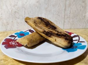 Una foto de Tamales de mole negro ✨