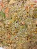 Risotto zucchine e salmone affumicato con granella di pistacchi
