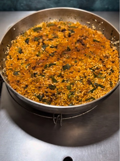 Una foto de Arroz enchiplotado