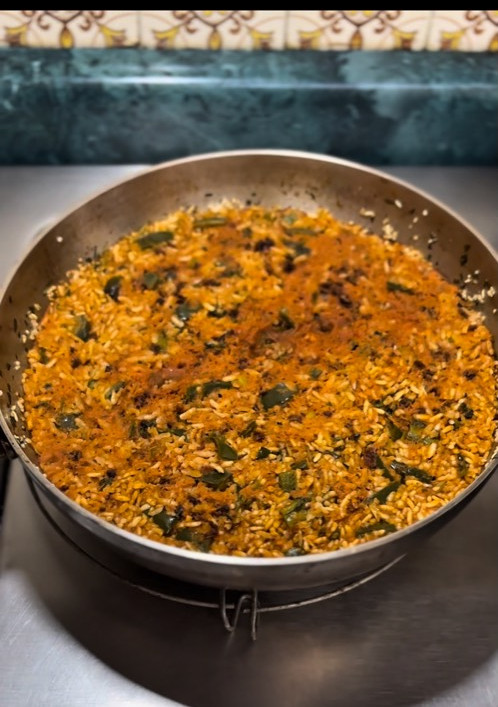 Una foto de Arroz enchiplotado