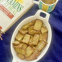 A picture of Sesame seeds and Spinach Teatime Bites in Airfryer.