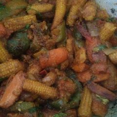 A picture of Baby corn fry with carrot and capsicum.