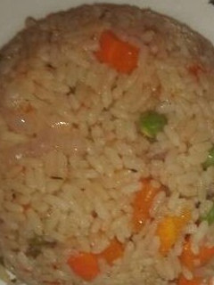 A picture of Tallof rice with spices.