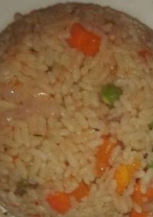 A picture of Tallof rice with spices.