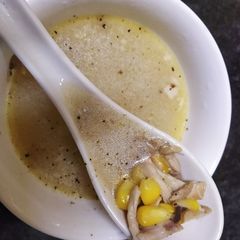 A picture of Cream of chicken sweet corn soup.