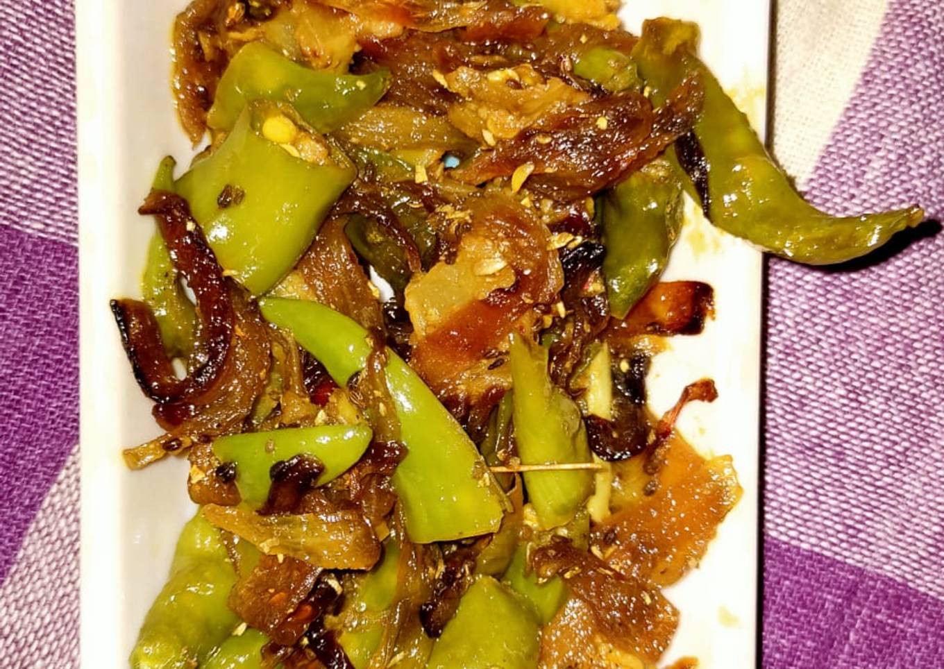 Roasted peppers with onions and raw mango