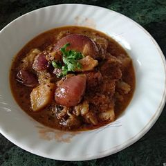 A picture of Stuffed onion aloo sabzi....Bharelu Kanda batata nu shaak.