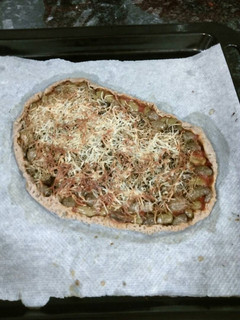 Una foto de Coca estilo pizza