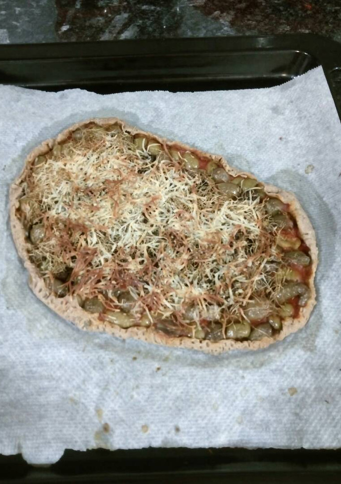 Una foto de Coca estilo pizza