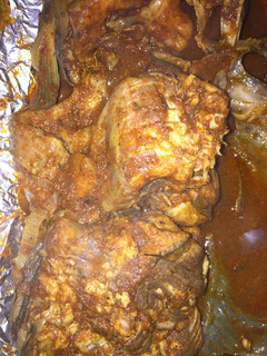 A picture of Roasted fish in onion and garlic paste# Abuja.