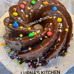 A picture of Chocolate bundt cake with ganache topping:.