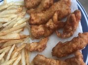 Una foto de sobras de pollo frito
