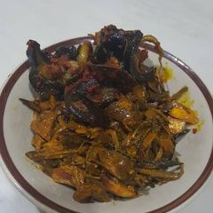 A picture of Ugba and peppered snail.