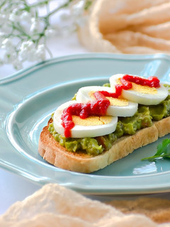 A picture of Avocado open faced sandwich.