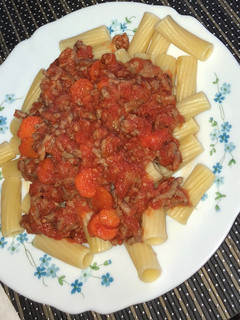 Una foto de Pasta con tomate natural