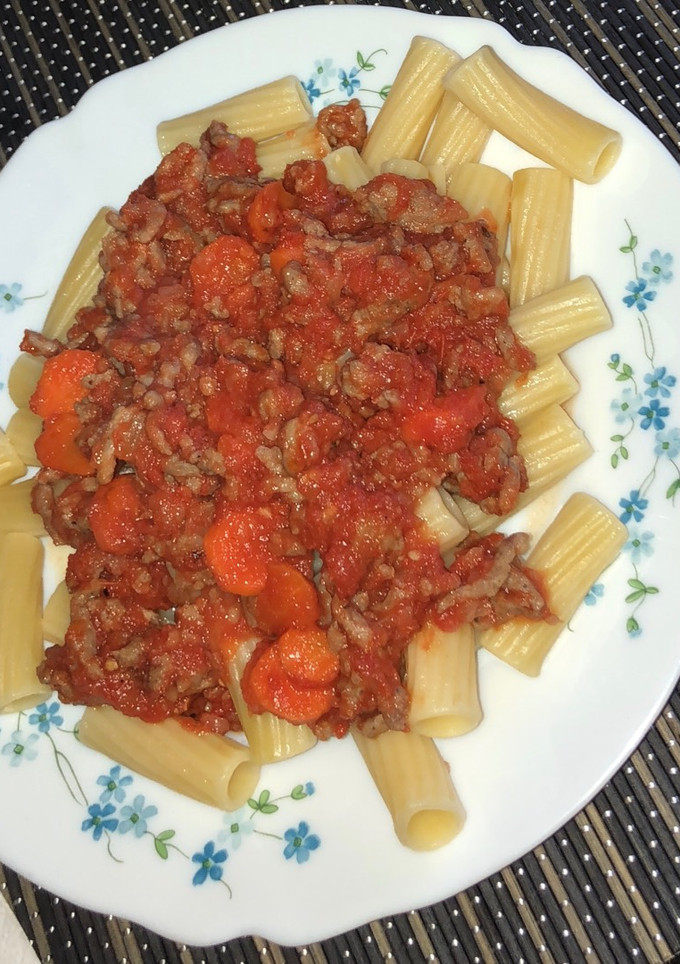Una foto de Pasta con tomate natural