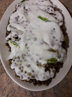 A picture of Pigeon beans/mbaazi with coconut sauce.