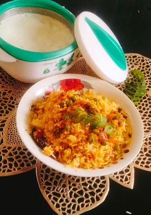 A picture of Tomato peas masala pulao 🍅😋.