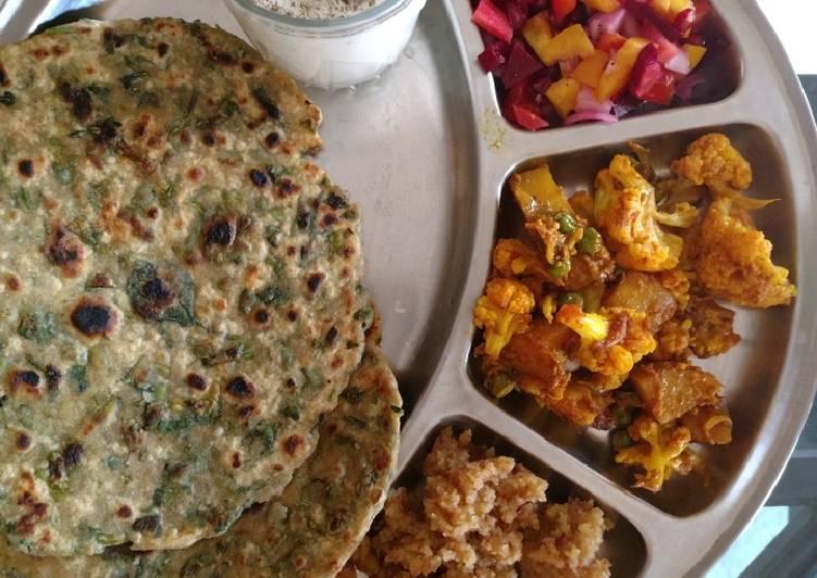 Methi paranthe with chaas aalu Gobhi sabji, salad and halwa