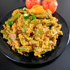 A picture of Ridge Gourd Curry With Poppy Seeds Paste.