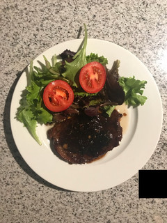 Una foto de Carne encebollada