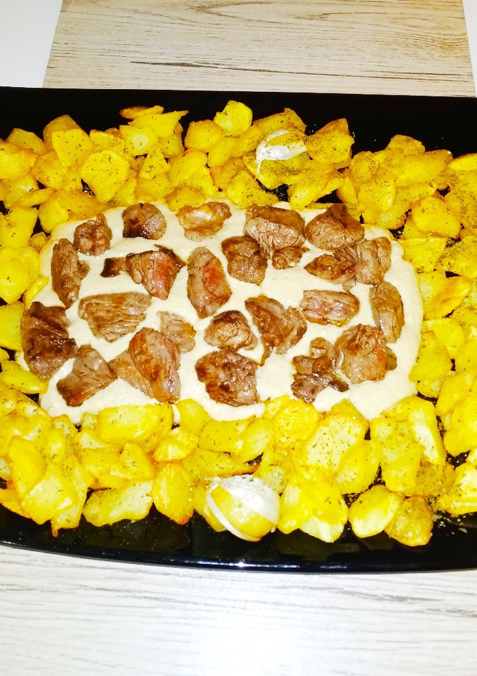 Una foto de Picos de solomillo de ternera con salsa roquefort