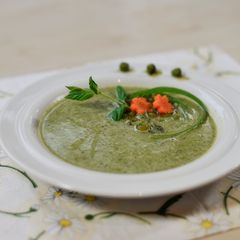 A picture of Pea soup with mint and ginger.