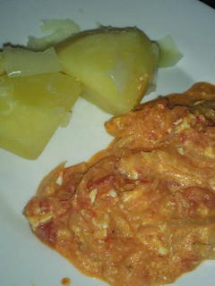 Una foto de Tomatican con papas cocidas
