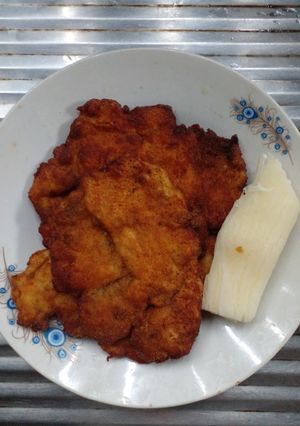 Una foto de Milanesa de pollo al orégano
