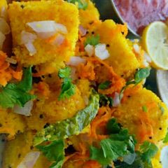 A picture of Rice and dal ke khamman.