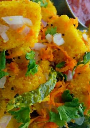 A picture of Rice and dal ke khamman.