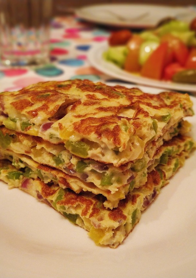 Una foto de Tortilla de pimientos y queso