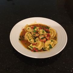 A picture of Chili Lemon Shrimp with Lobster Ravioli.