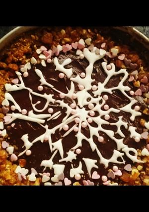 A picture of Very chocolaty cake with snowflake.