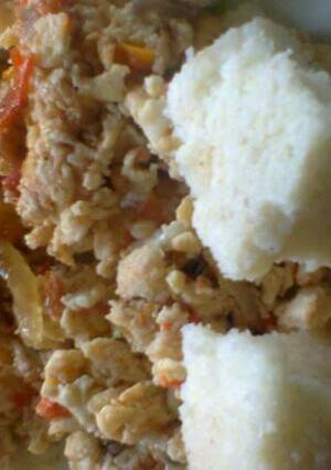 A picture of Scrambled eggs with ugali.
