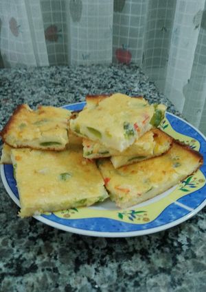 Una foto de Fainá de zapallitos revueltos