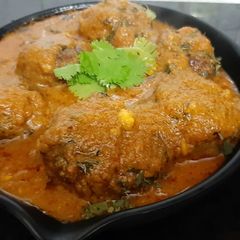 A picture of Palak paneer kofta.
