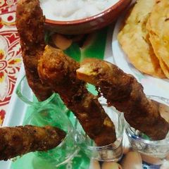 A picture of Chicken fried sticks.