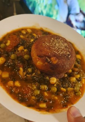A picture of Veggie Balls with Spinach Sauce.