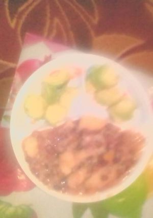 A picture of Kenyan muthokoi served with avocado.