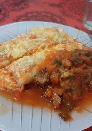 Una foto de Canelones de jamón y queso