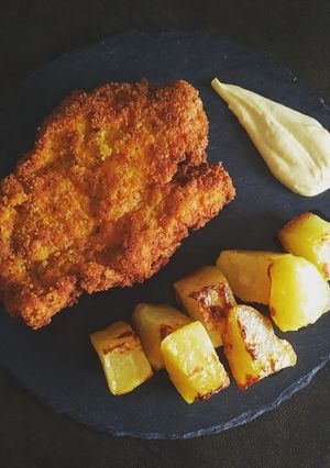 A picture of Chicken Cutlets with Green Tea and Turmeric, Served with Roasted Potatoes.