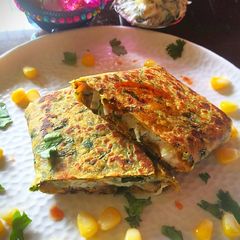 A picture of Cheesy methi paratha roll/pocket.