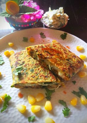 A picture of Cheesy methi paratha roll/pocket.