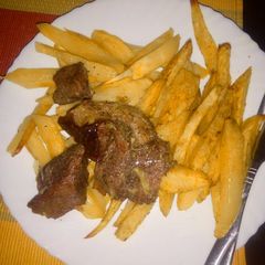 A picture of Sliced, peppered fried beef.