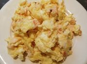 A picture of scrambled eggs with fish