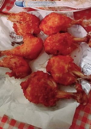 A picture of Delicious crispy chicken drumsticks.