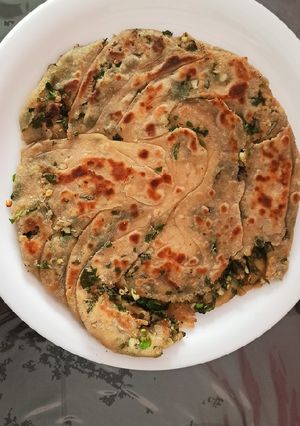 A picture of Green chilli and garlic laccha paratha.